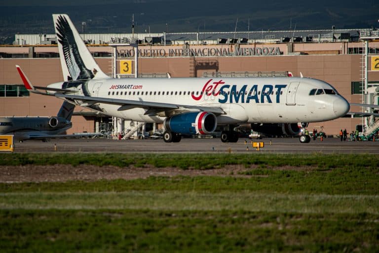JetSMART Airbus A320 on the runway at Mendoza International Airport in Argentina.